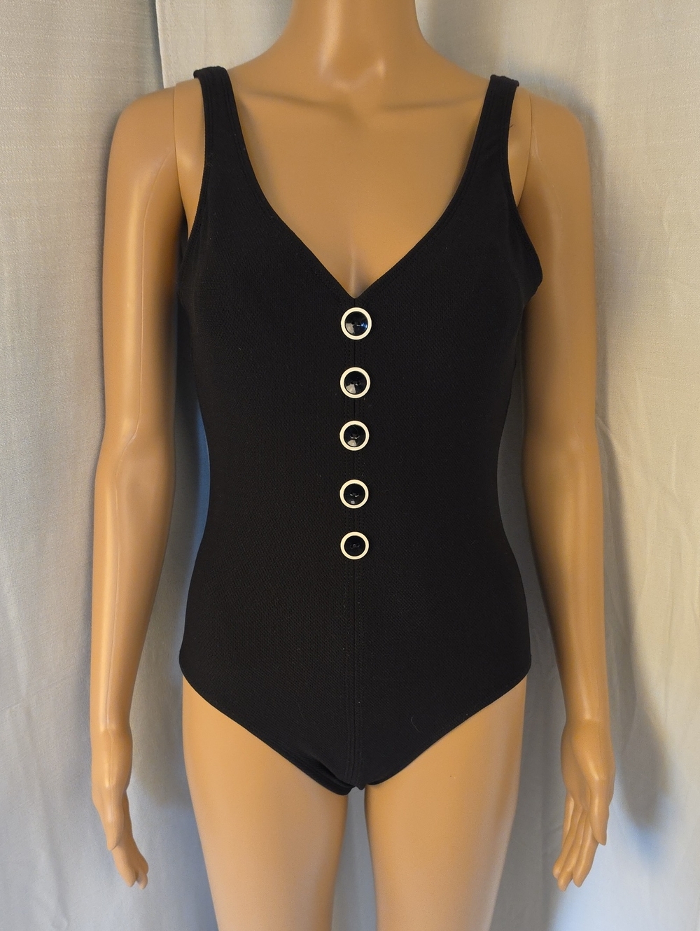 Mainstream Black One-Piece Swimsuit with Decorative Buttons and Lined Bra
